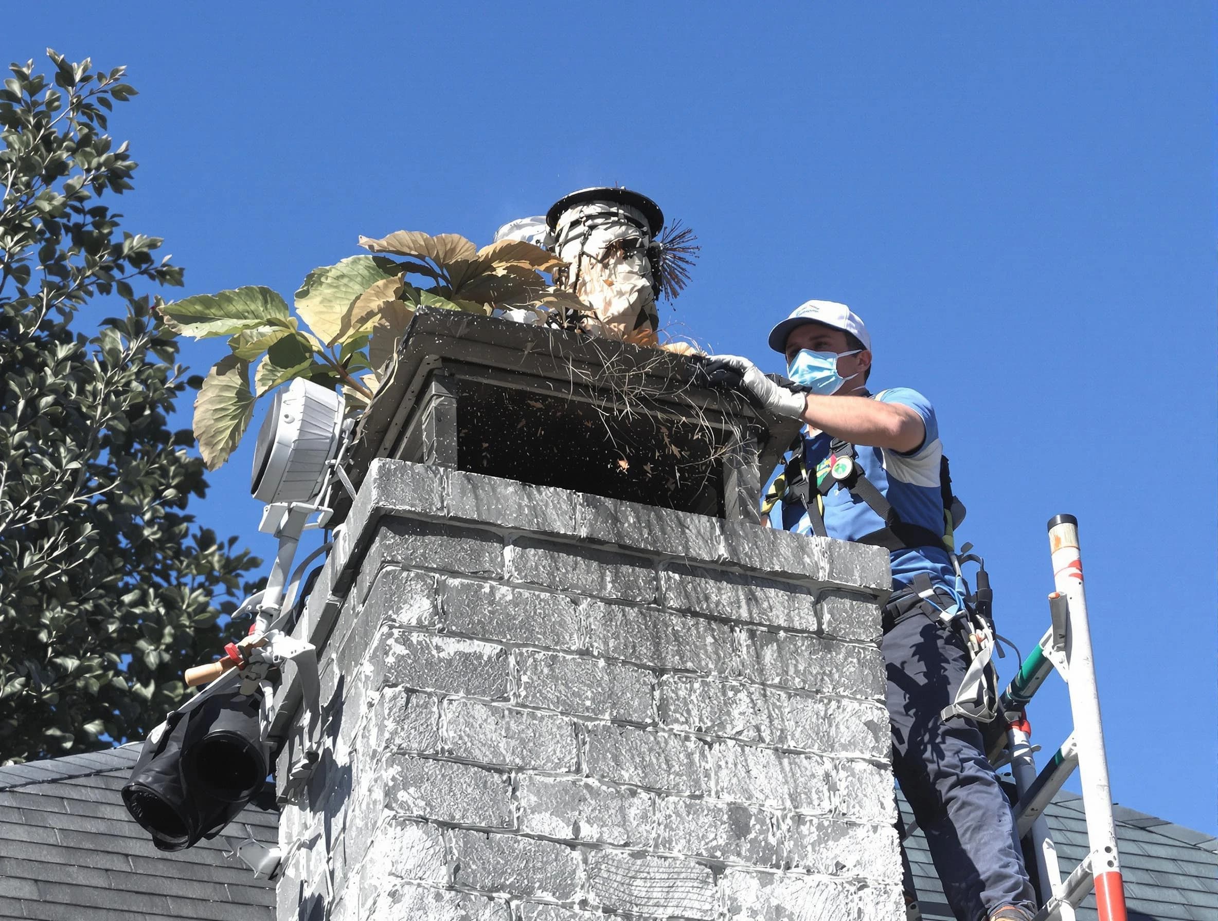 Coolidge Chimney Sweep specialist performing chimney cleaning in Coolidge, AZ