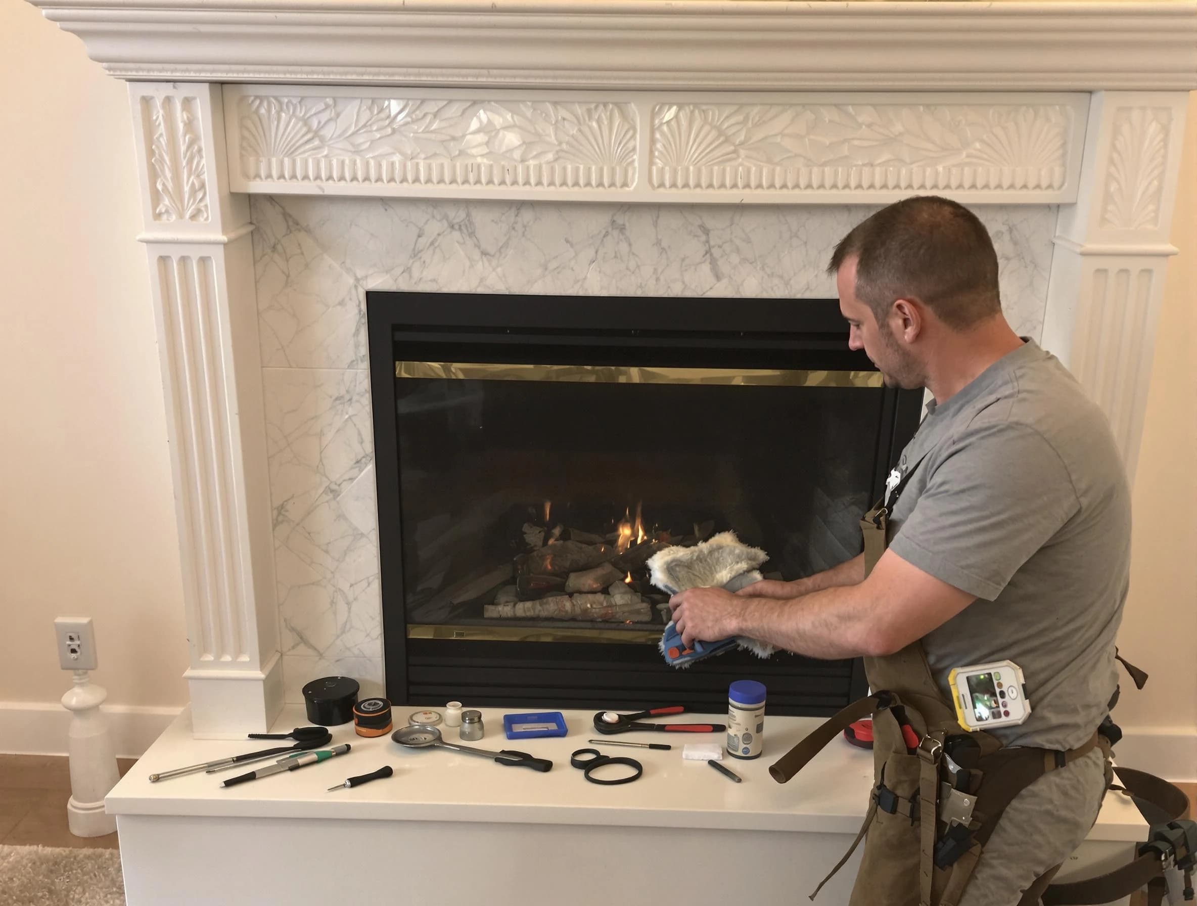Coolidge Chimney Sweep performing fireplace maintenance in Coolidge, AZ